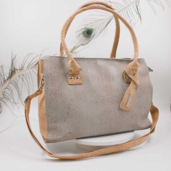 Handmade Portuguese grey cork bag with zipper closure, shoulder strap, multiple compartments, and vegan cork leather