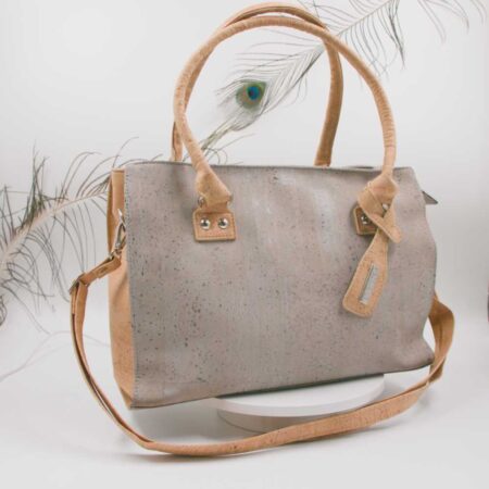 Handmade Portuguese grey cork bag with zipper closure, shoulder strap, multiple compartments, and vegan cork leather